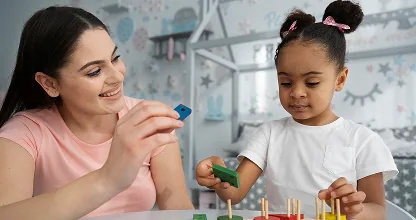 Child doing a fine motor skills activity during occupational therapy
